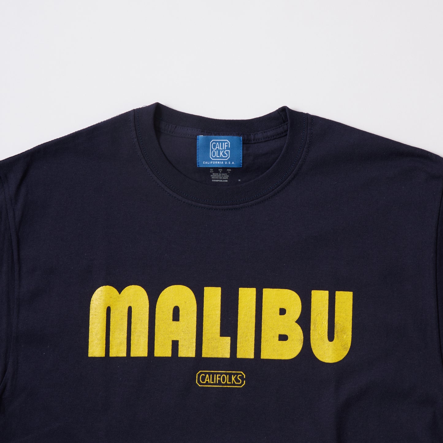 CALIFOLKS S/S WORD PRINT US CHAMPION 6oz CREW T-SHIRT - MALIBU